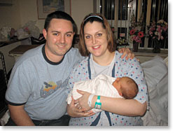 photo of Molly and her Mommy and Daddy