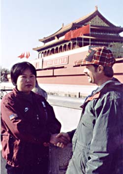 Chuck shaking hands with a chinese woman